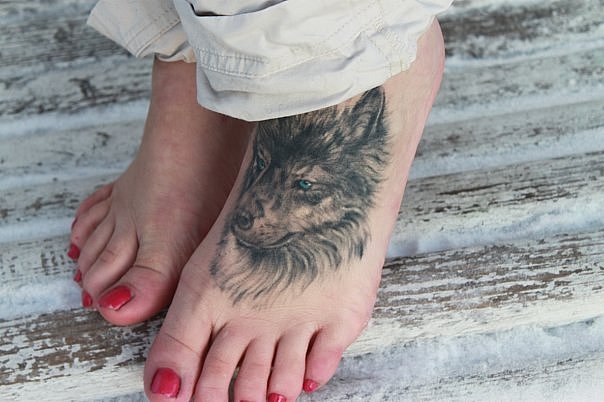 Что означает татуировка волк?