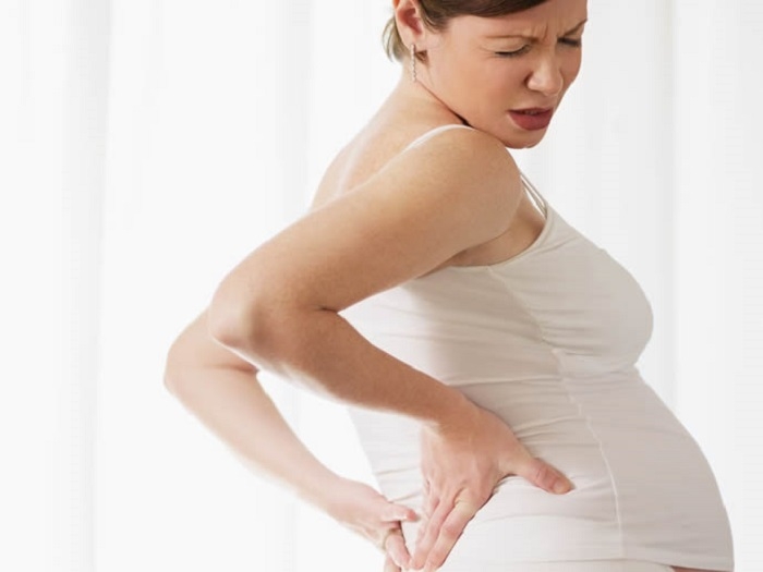 Боль в правом боку со стороны спины во время беременности