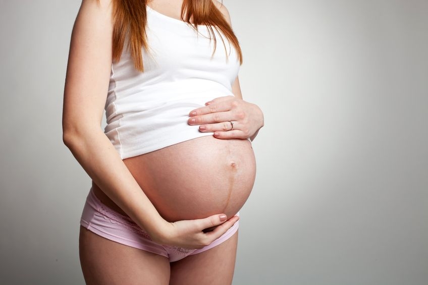 Почему при беременности появляется полоска на животе?