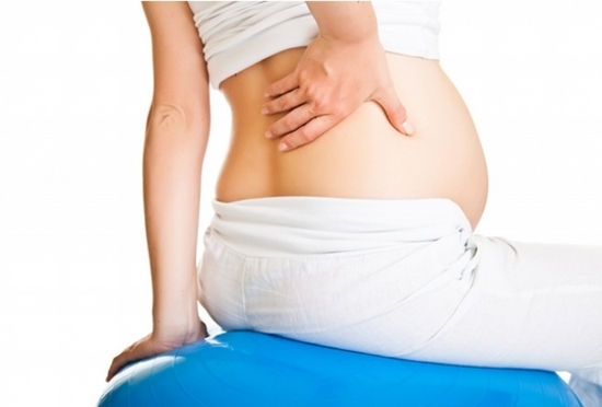 Почему болит под правым ребром при беременности?