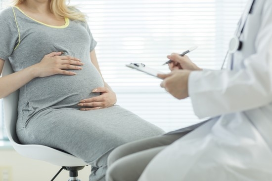 почему болит желудок при беременности